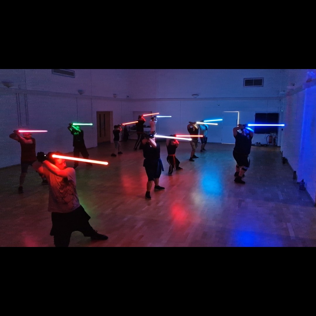 Vanguard LED Saber Academy students training with illuminated sabers